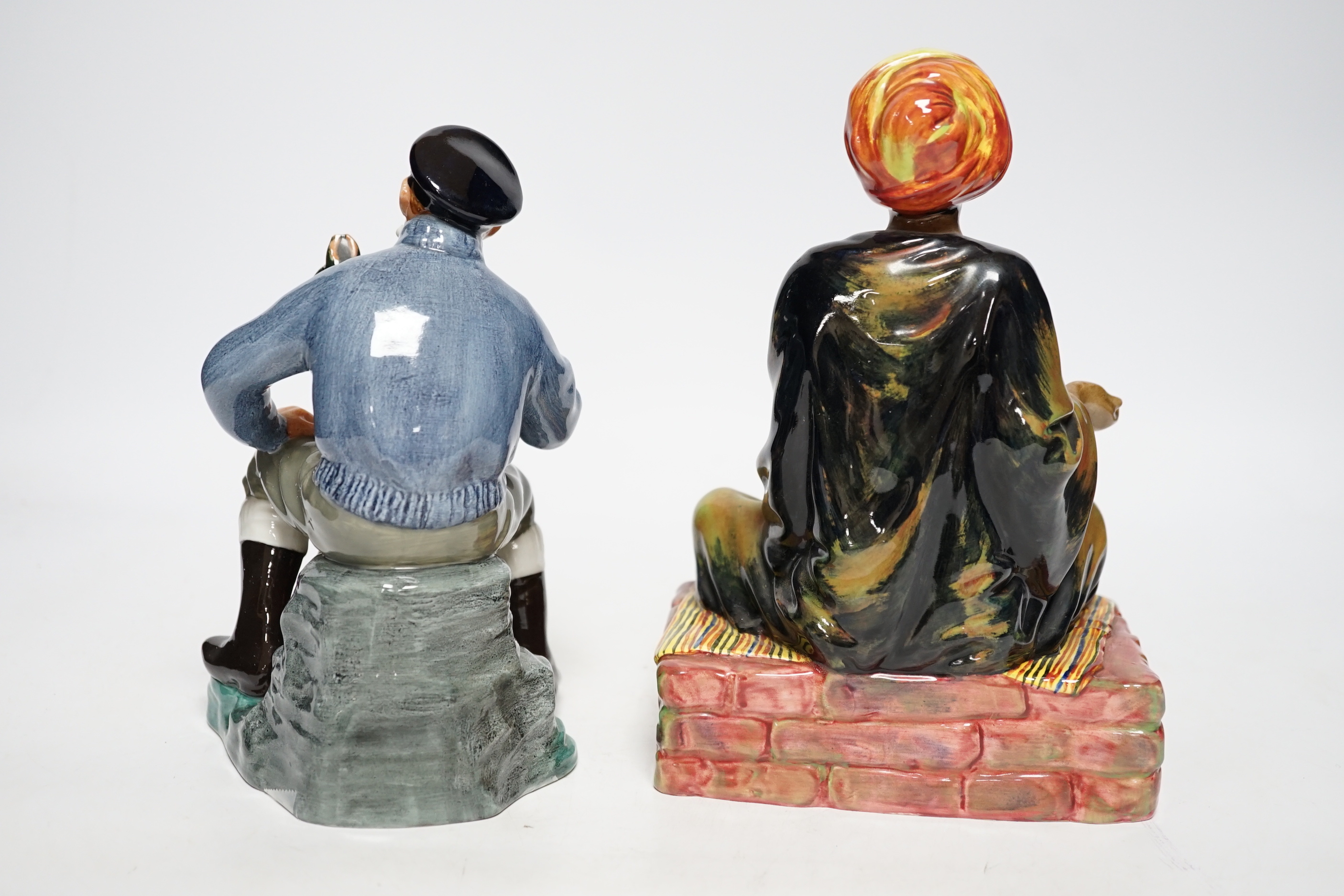 Two Doulton figures, Lobster Man and Mendicant